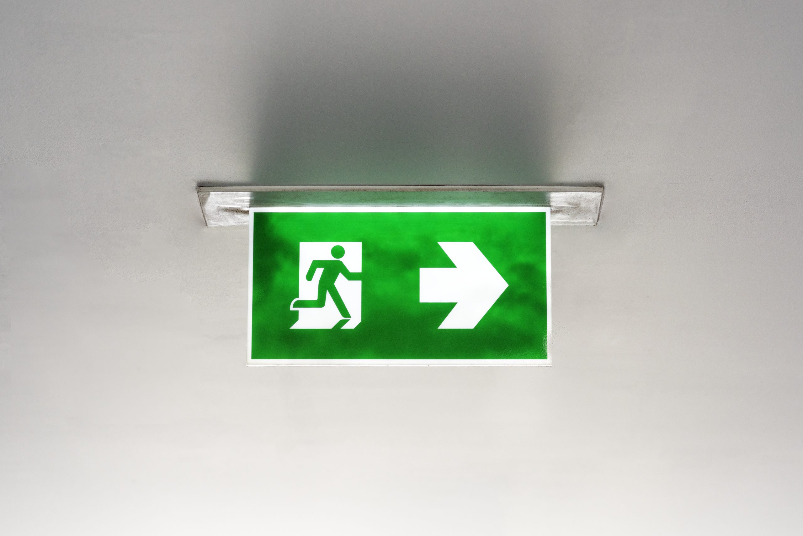 Green emergency exit sign ceiling scaled